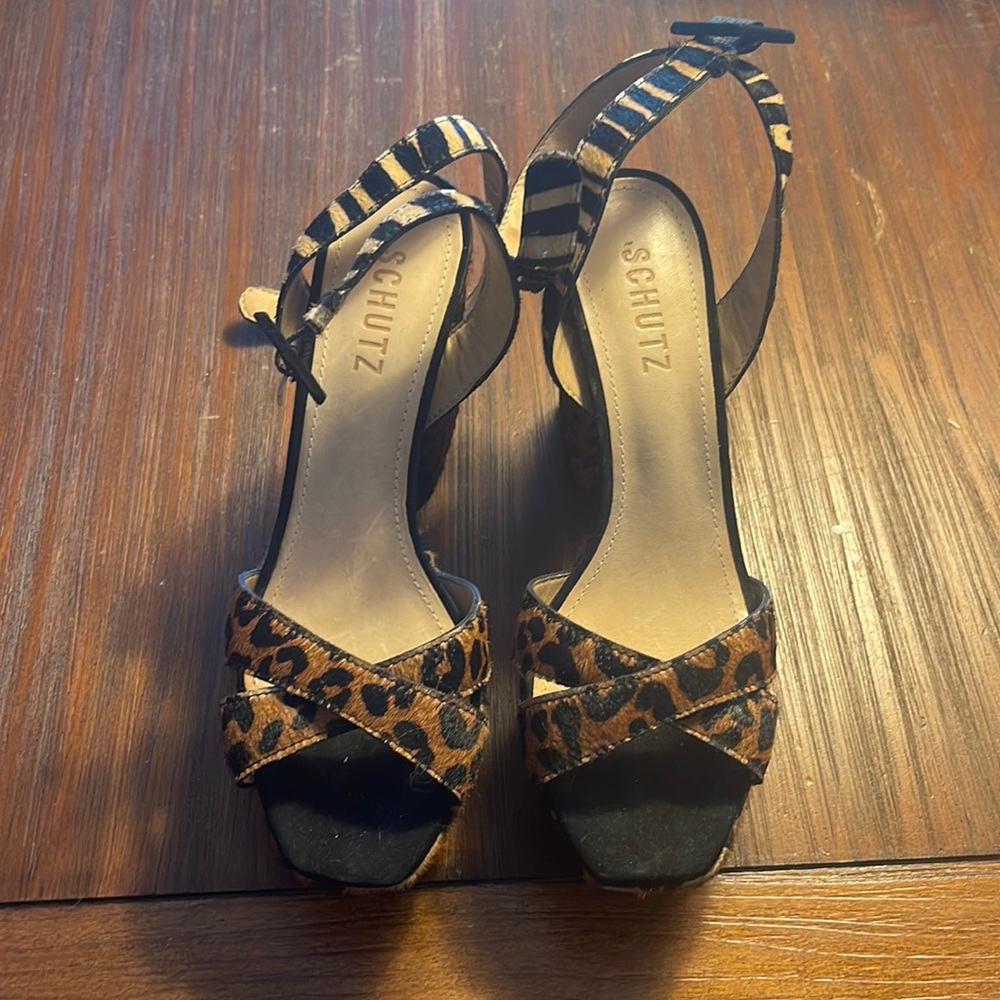 Schutz zebra/cheetah print platforms, size 6. Never worn. Made in Brazil.